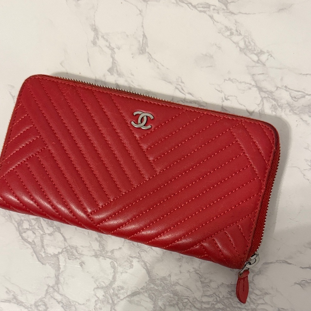 CHANEL Red Quilted Chevron Zip Wallet with Silver CC